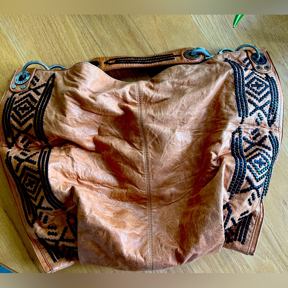 Gently used Rebecca Minkoff Navajo hobo purse, caramel with black design
